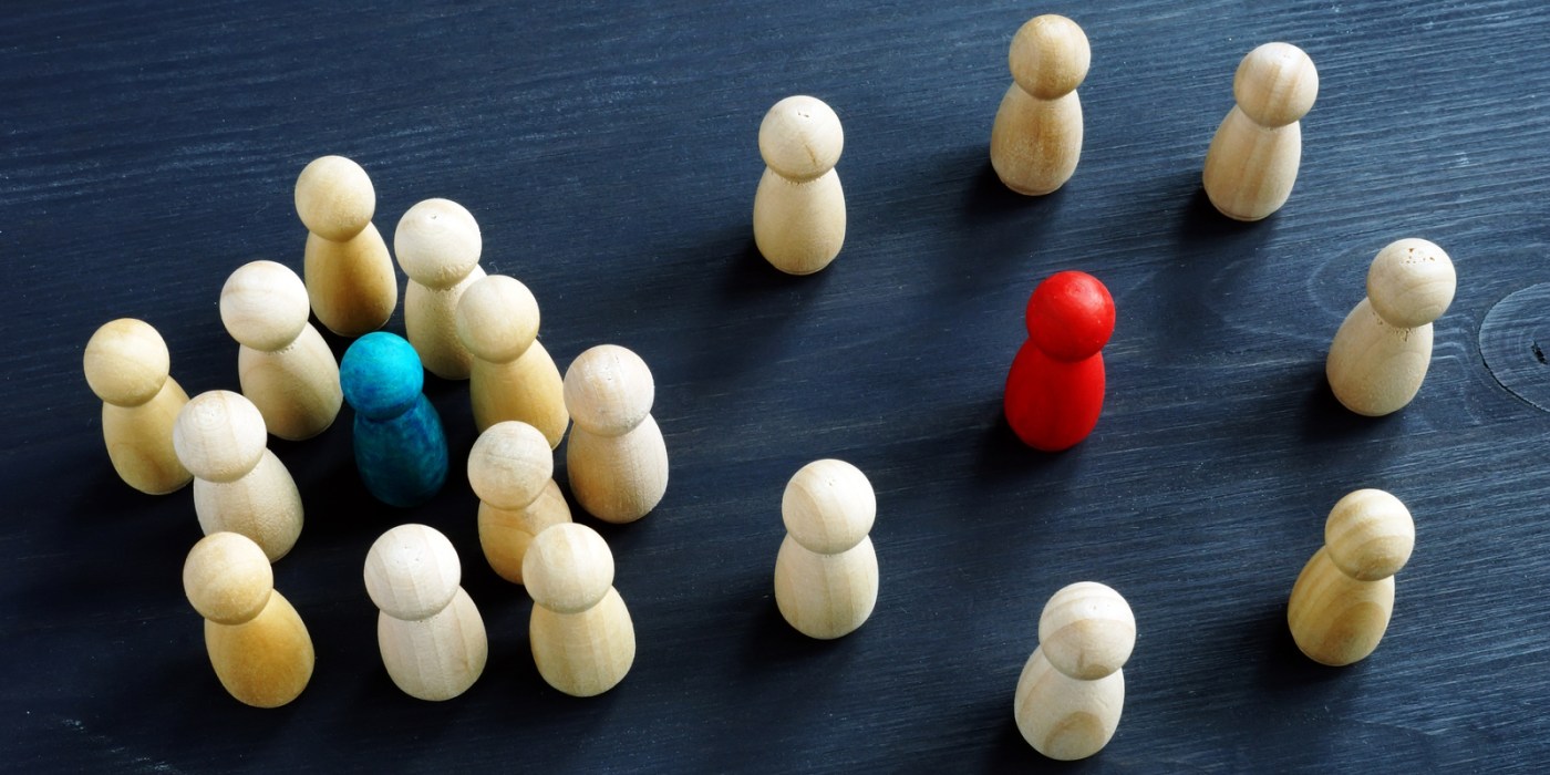 Wooden figures showing an Introvert and Extrovert